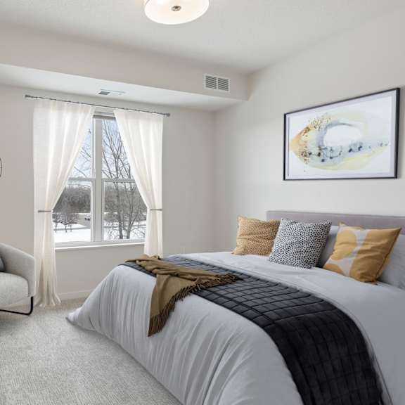 an example of a bedroom with a bed and a window