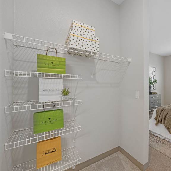 a white shelf with three boxes on it at copa flats apartments, arizona
