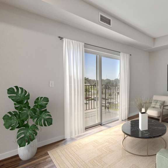 a living room with a couch and a coffee table and a balcony at eastgate apartments, minnesota, 55904
