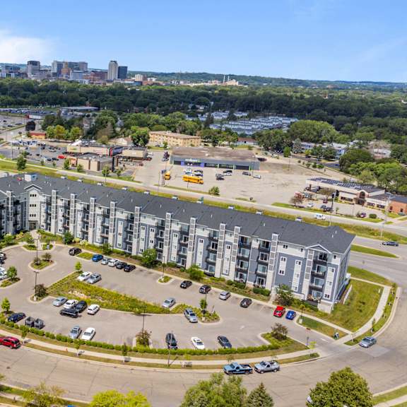an aerial view of an apartment building in a parking lot at eastgate apartments, rochester, minnesota