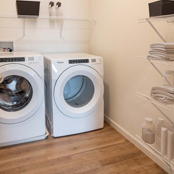 a washer and a dryer in a laundry room