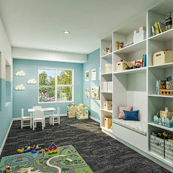 a child's room with a play mat on the floor and a picture of a elephant on the wall.