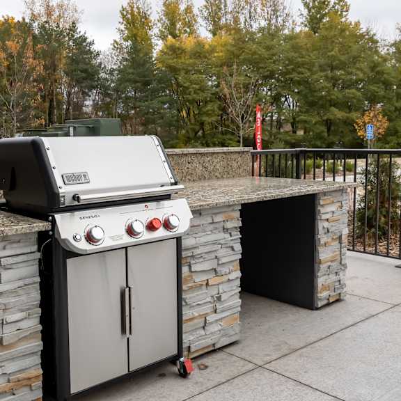 grill in outdoor patio area