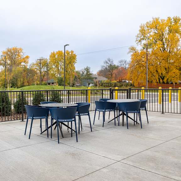 outdoor area with tables and chairs