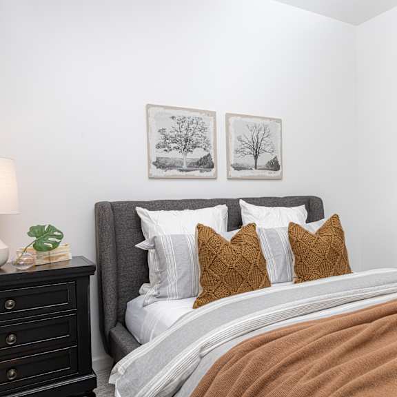 a bedroom with a bed and a closet