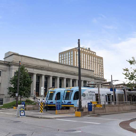 a city bus is parked at parkside apartments, st. paul, 55101