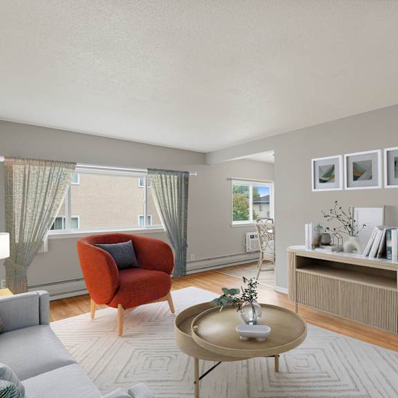 a living room with a couch and a coffee table at ames lake neighborhood apartments, minnesota