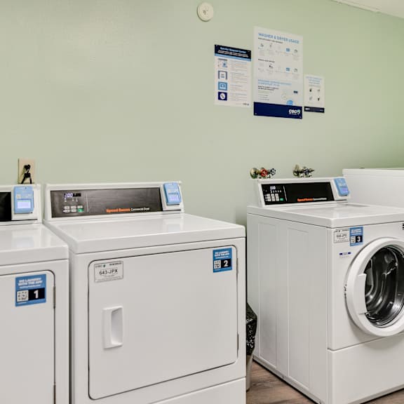 laundry room at pheasant park apartments, new hope, mn