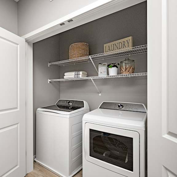 a laundry room with a washer and dryer.