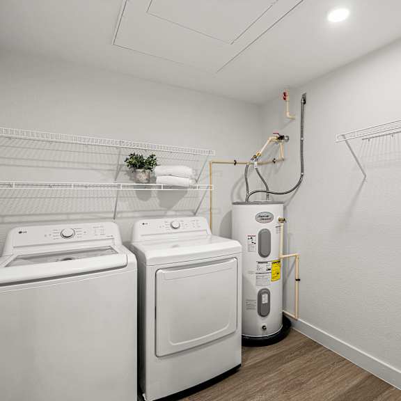 a laundry room with a washer and dryer.