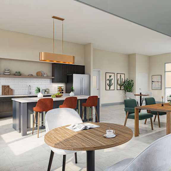 a modern kitchen with a dining table and chairs.