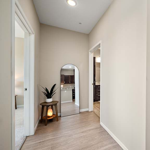 a white door is on the right side of the image at the winslow 62+ apartments, minnesota, 55118