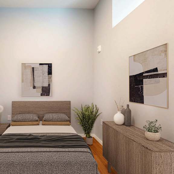 Thumbnail 6 of 6 A bedroom with a bed, nightstand, and two framed pictures on the wall.
