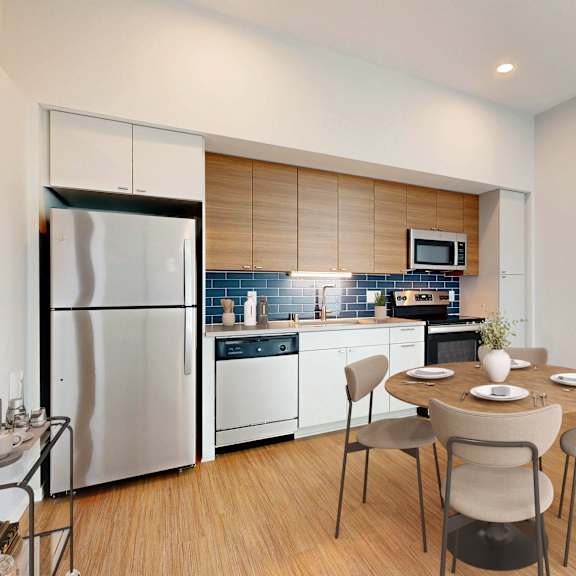 Thumbnail 4 of 6 A modern kitchen with a dining table set for four.