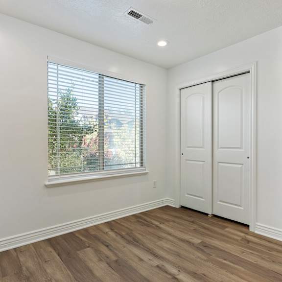 a room with a window and a door.