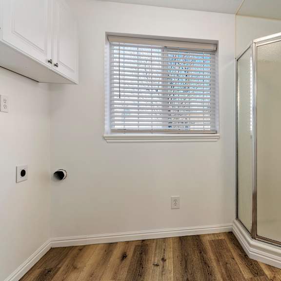 a small bathroom with a shower and a toilet