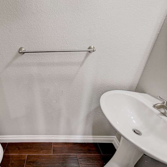 a bathroom with a toilet and a sink