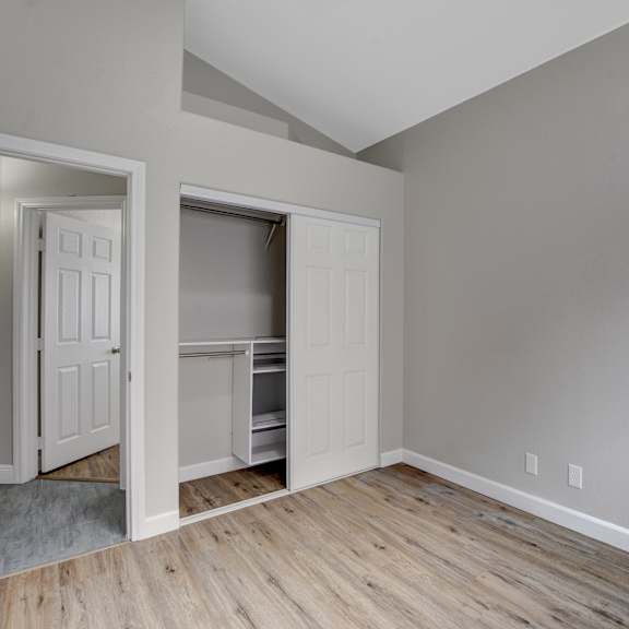 a room with a white door and a white wall.