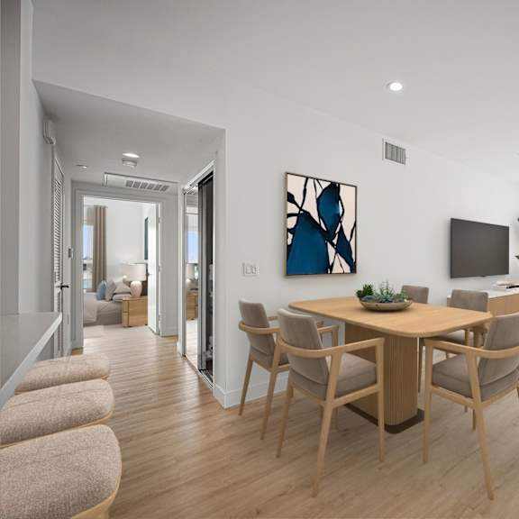 a modern living room with a dining table and chairs.
