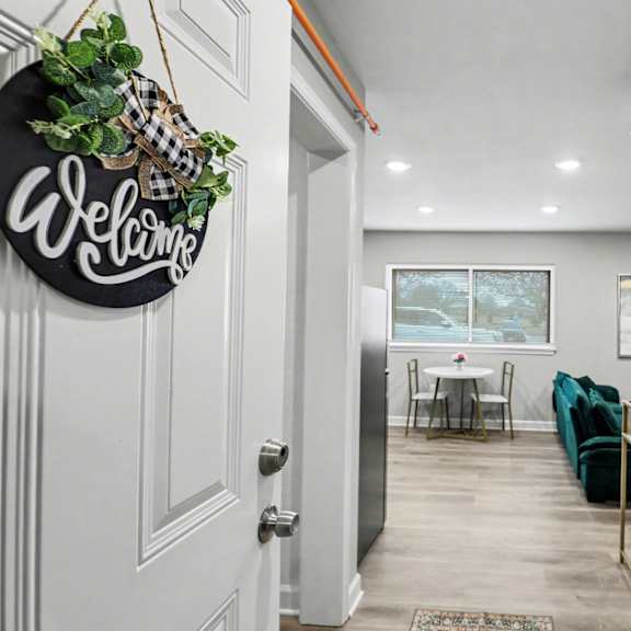 a hallway entering an apartment  at mayfair apartments, kansas city, missouri