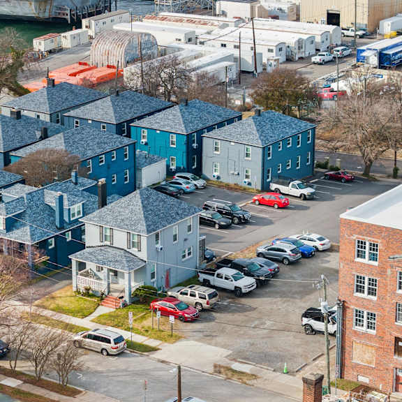 a view of a residential area with houses and cars at shipyard shores apartments, newport news