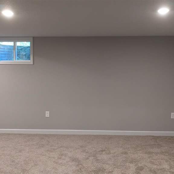a bedroom with a window