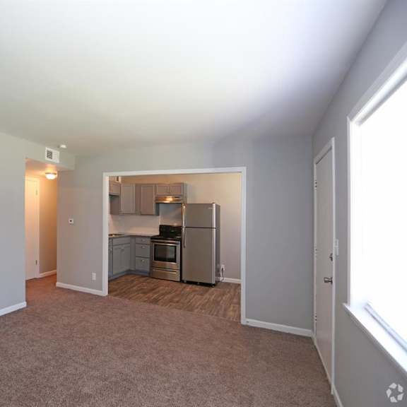 a living room and a kitchen