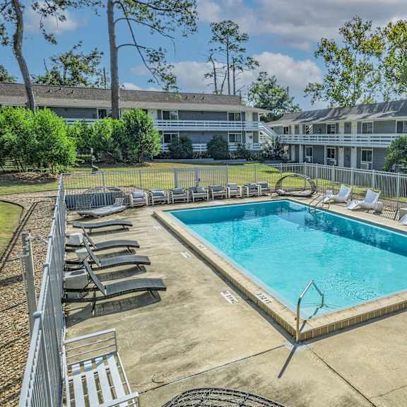 pool with relaxing chairs at the sanctuary, tallahassee, florida