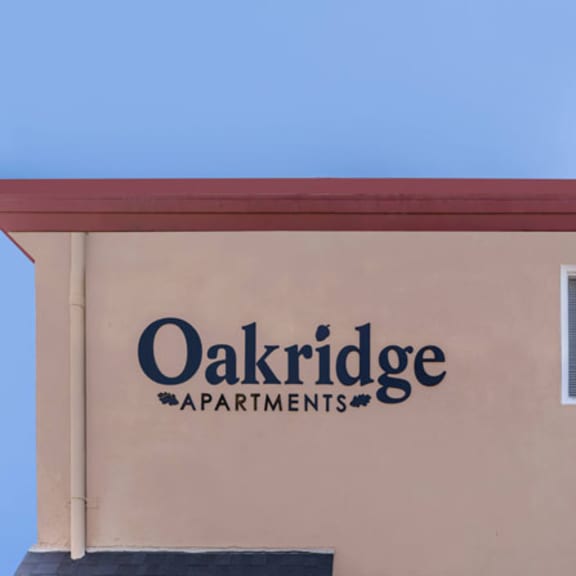 Thumbnail 13 of 19 The building is called Oakridge Apartments.