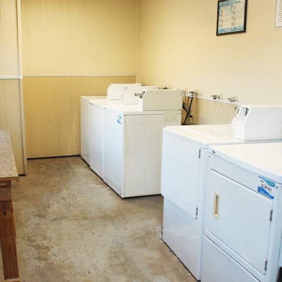 a laundry room with a washer and dryer.