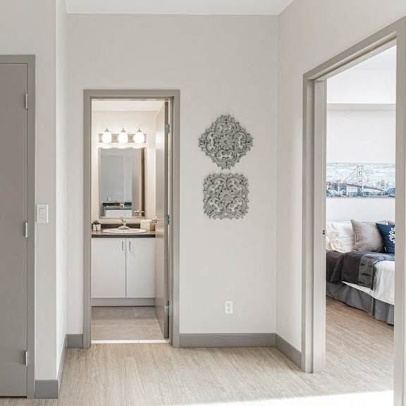 a grey double door is on the left of the image.