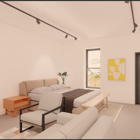 a living room with a white couch and a brown side table.