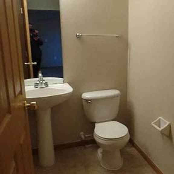 a small bathroom with a toilet and a sink