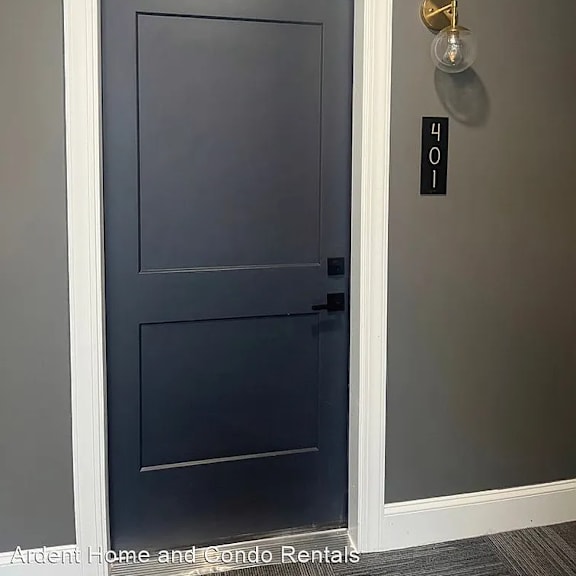 a blue door with a white frame and a door knob