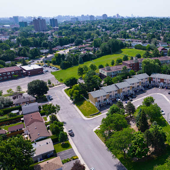 a bird's eye view of a residential area with houses and roads.