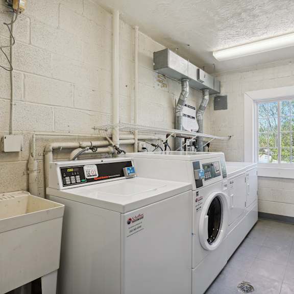 a laundry room with a washer and dryer.