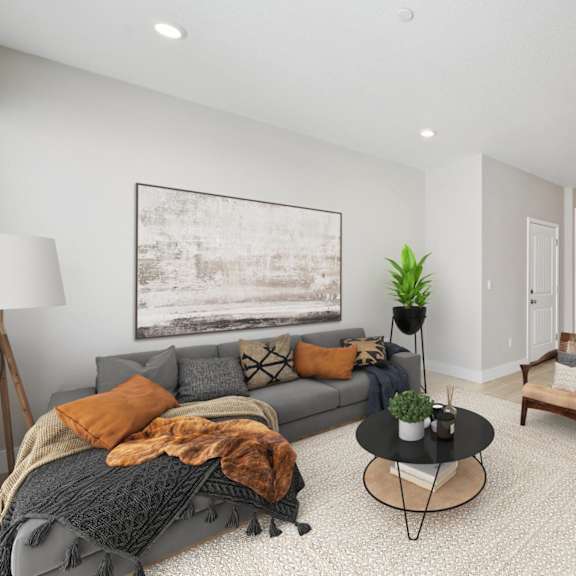 a living room with a grey couch at montessa apartments, vacaville, 95687