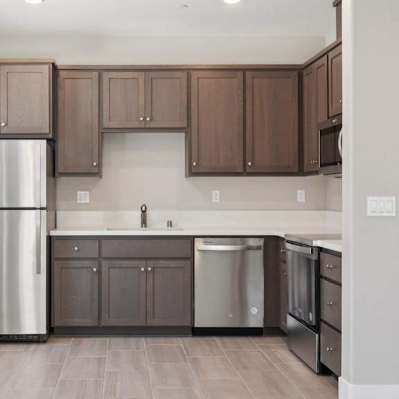 a kitchen with wooden floor at montessa apartments, vacaville, ca, 95687