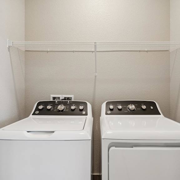two white washing machines at montessa apartments, vacaville, ca
