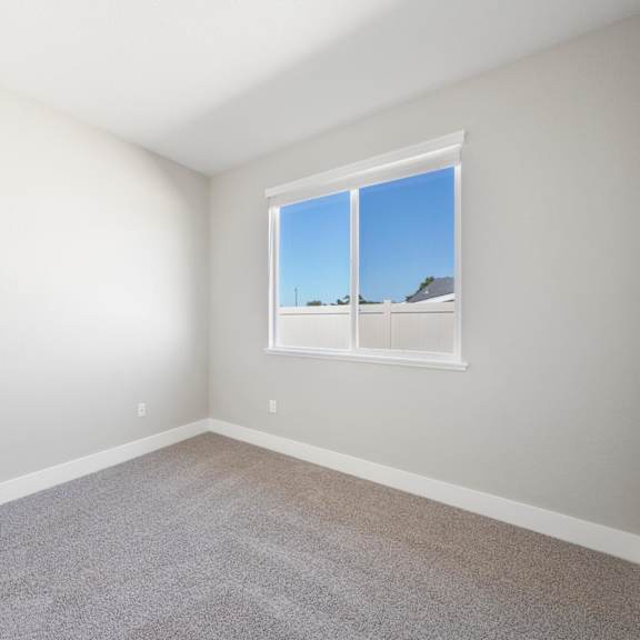 a room with a window showing a blue sky at montessa apartments, vacaville