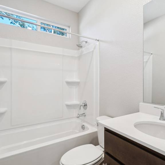 a bathroom with a bathtub at montessa apartments, vacaville, ca, 95687