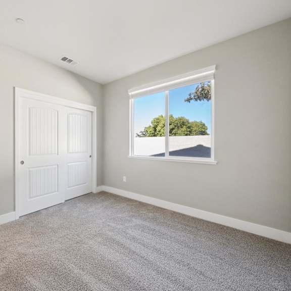 a room with sliding window at montessa apartments, vacaville, ca