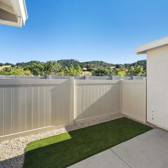 backyard with fence at montessa apartments, california, 95687