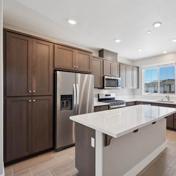 a kitchen with a cabinets at montessa apartments, california, 95687