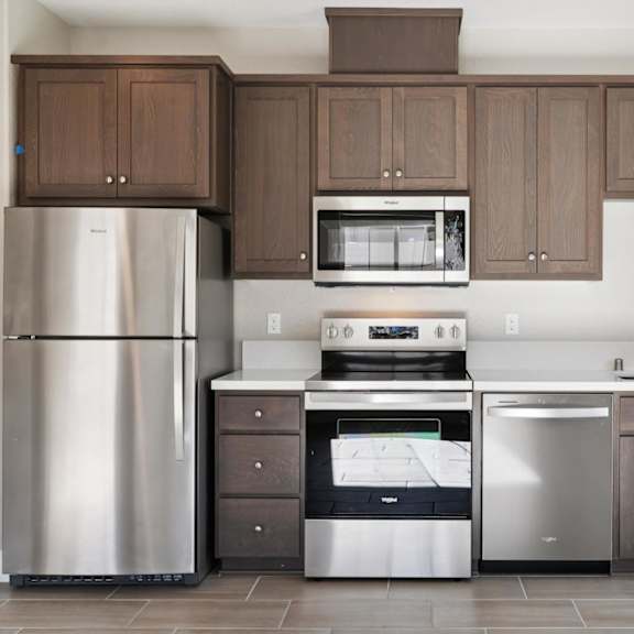 a kitchen with a oven at montessa apartments, vacaville, ca