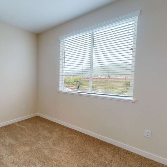 a room with a window and a door.