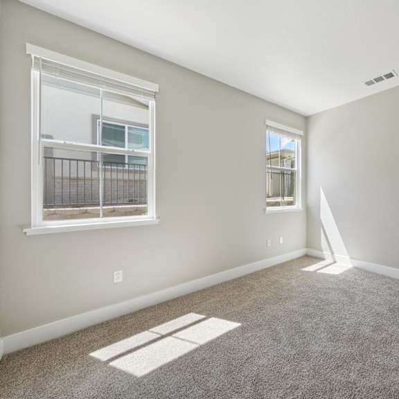 a room with a door at montessa apartments, california