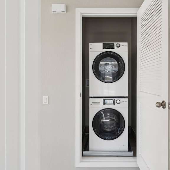 front-loading washing machine at montessa apartments, california