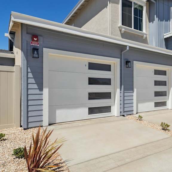 a modern house with two garages at montessa apartments, vacaville, ca