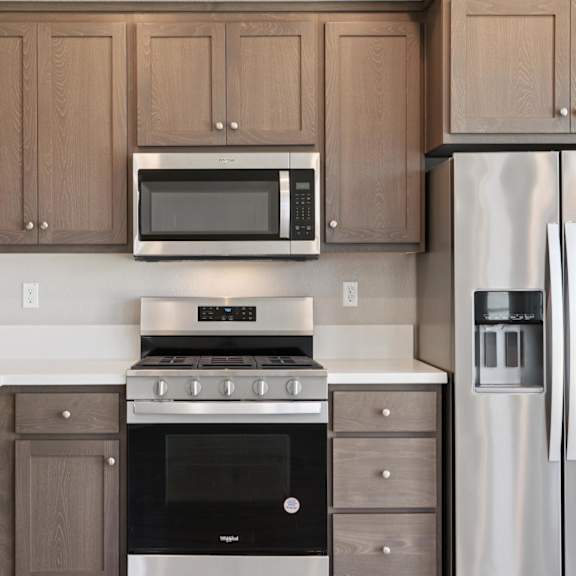 a kitchen with sink at montessa apartments, vacaville